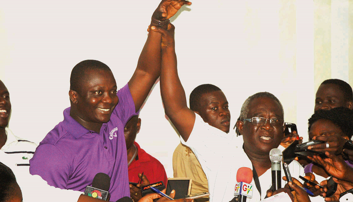 Mr Michael Agyekum Ansong, the District Returning Officer of the Electoral Commission (EC), proclaiming Mr Acheampong (left) as the winner Mr Michael Agyekum Ansong, the District Returning Officer of the Electoral Commission (EC), proclaiming Mr Acheampong (left) as the winner